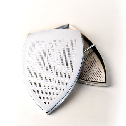 Zapatilla Teflón Plancha - Industrial ES-94AL con superficie perforada para mejor deslizamiento. Accesorio ideal para planchas industriales.